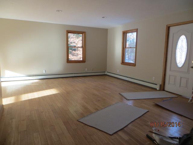 502 River Road Lebanon, ME 04027 - Photo 7 of 13 Living Room. Hard floor and freshly...