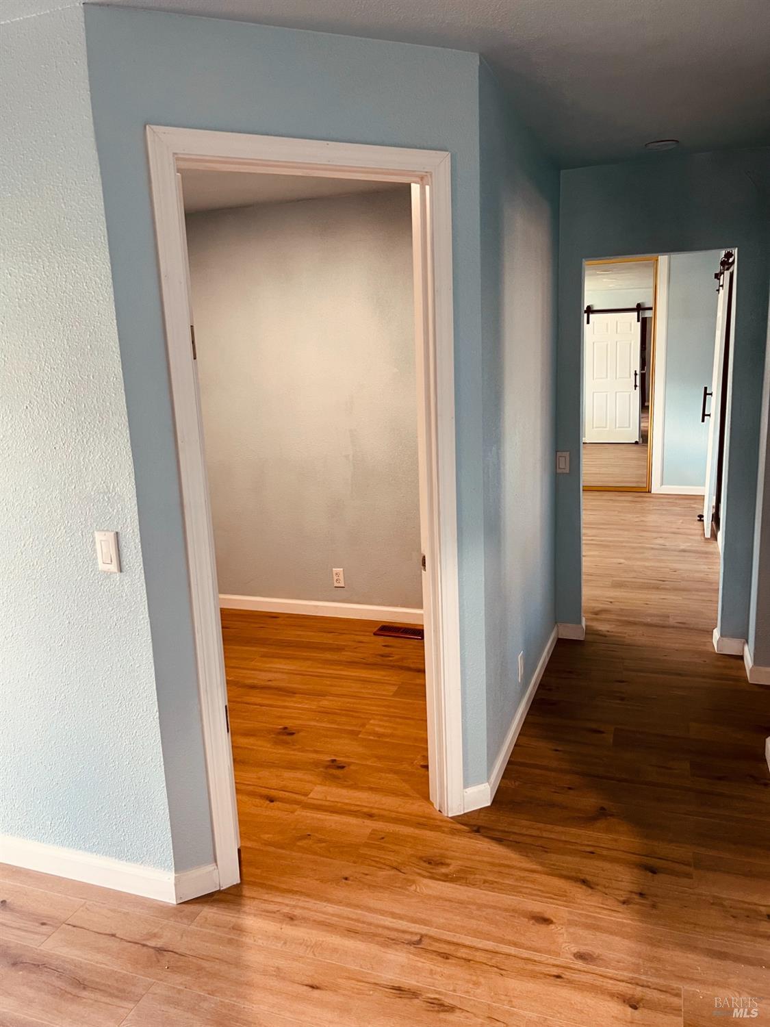 320 Chablis North Calistoga, CA 94515 - Photo 14 of 19 a view of empty room with wooden floor
