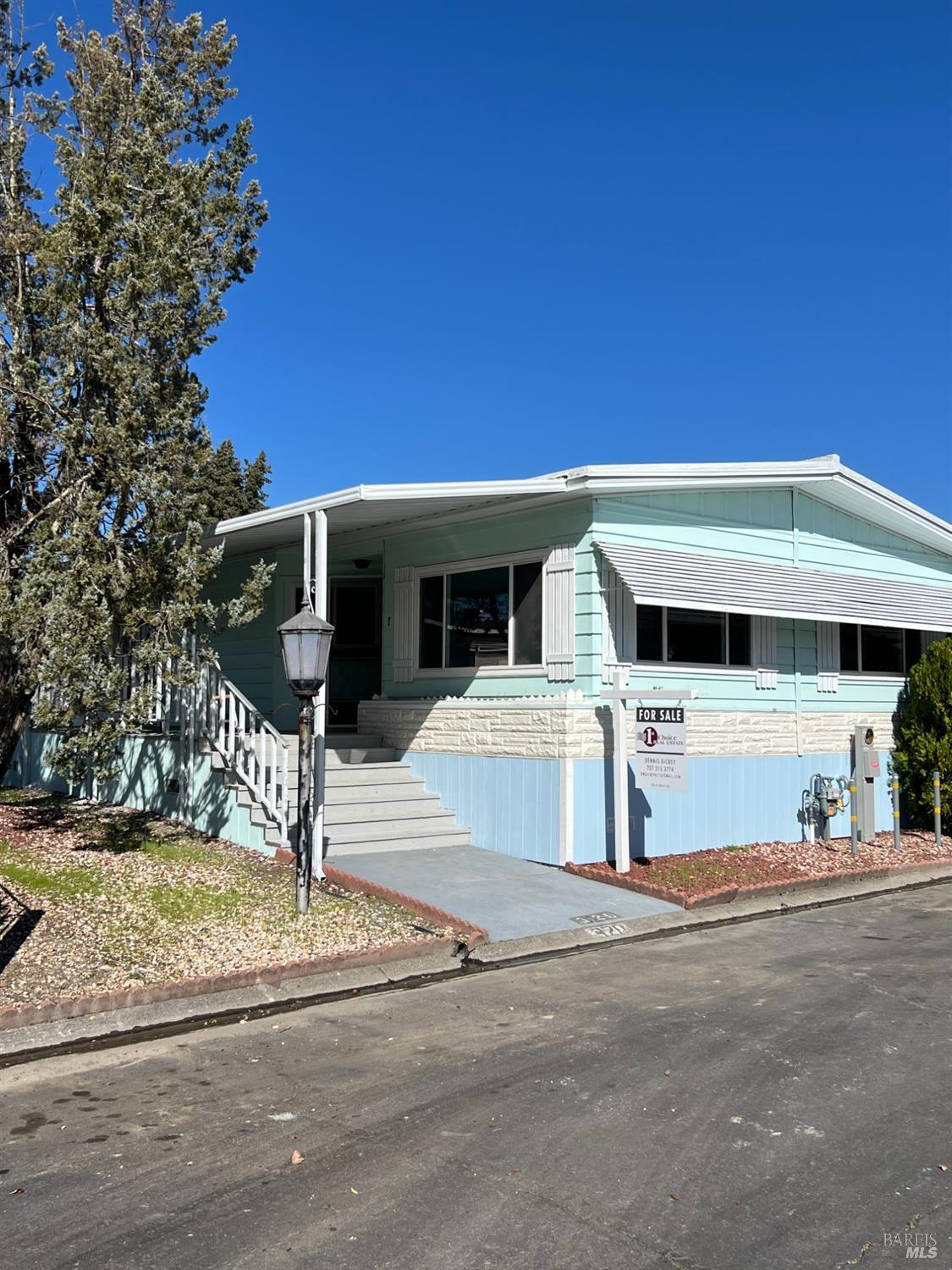 320 Chablis North Calistoga, CA 94515 - Photo 5 of 19 a front view of a house with a yard