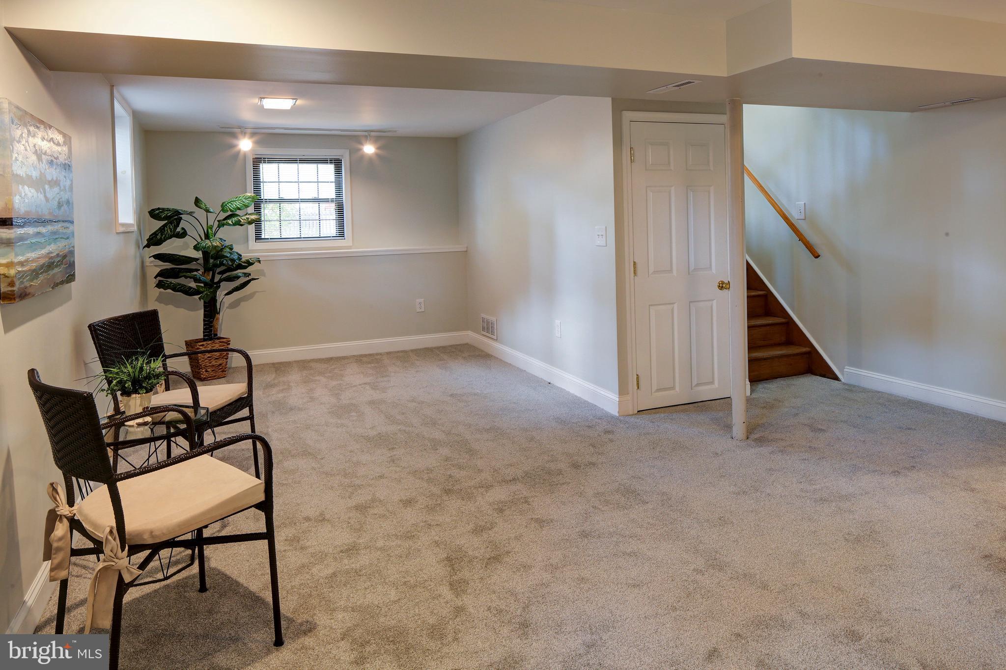 7959 East Shore Road Pasadena, MD 21122 - Photo 14 of 28 Large lower level family room