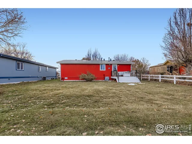 a view of a yard with an outdoor space