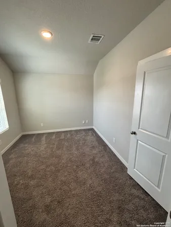 an empty room with a natural light