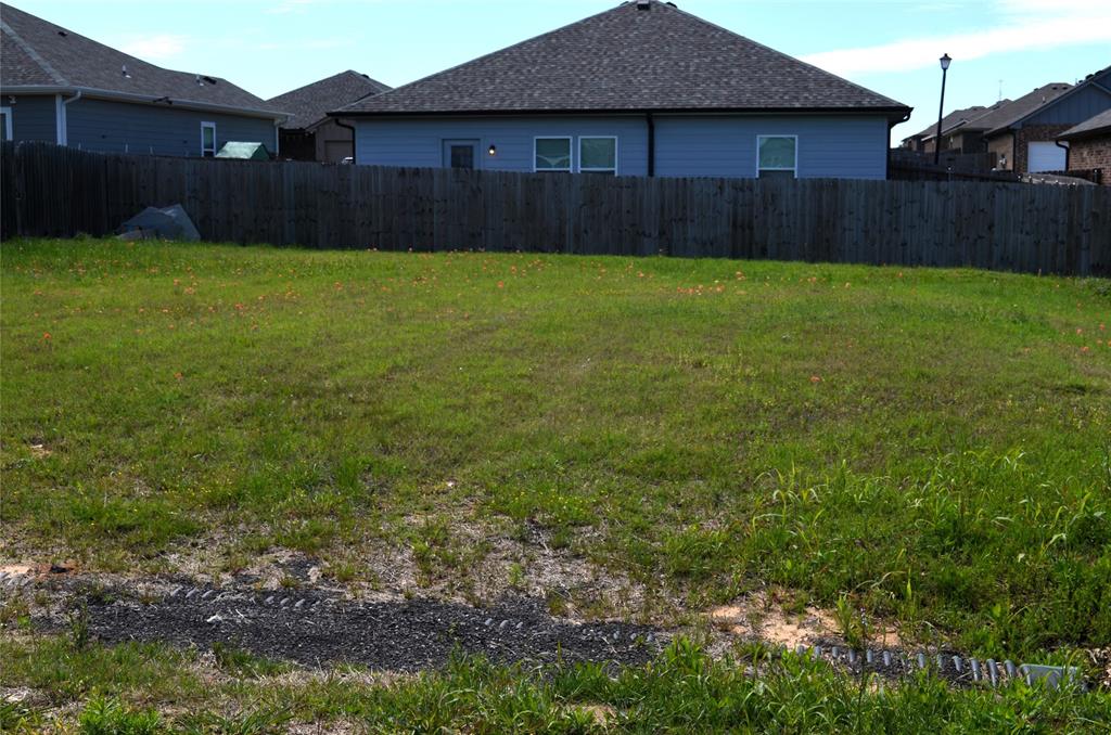 307 Rike Road Mabank, TX 75147 - Photo 3 of 4 a view of a backyard