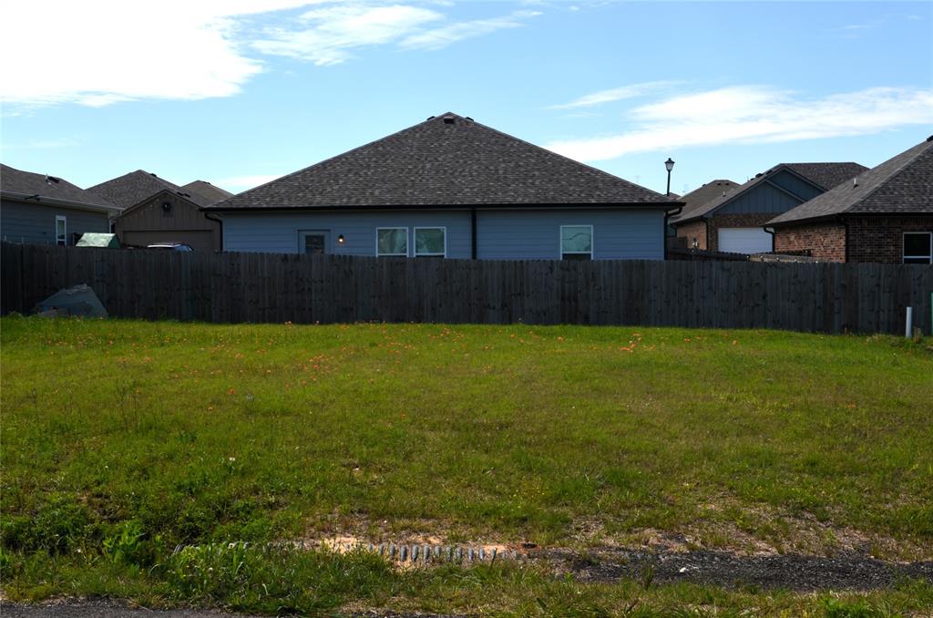307 Rike Road Mabank, TX 75147 - Photo 4 of 4 a view of a yard with a small cabin