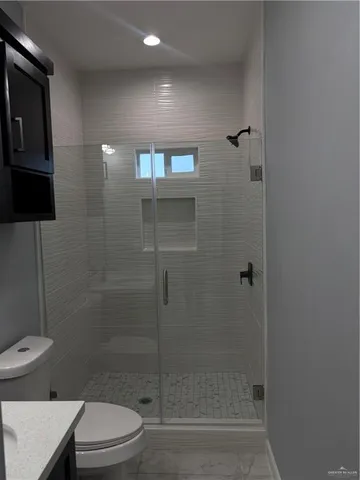 a view of hallway with walk in closet