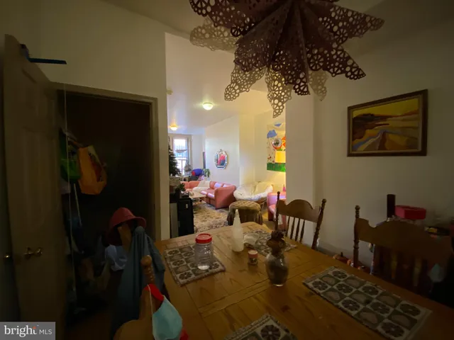 a view of a living room and dining room