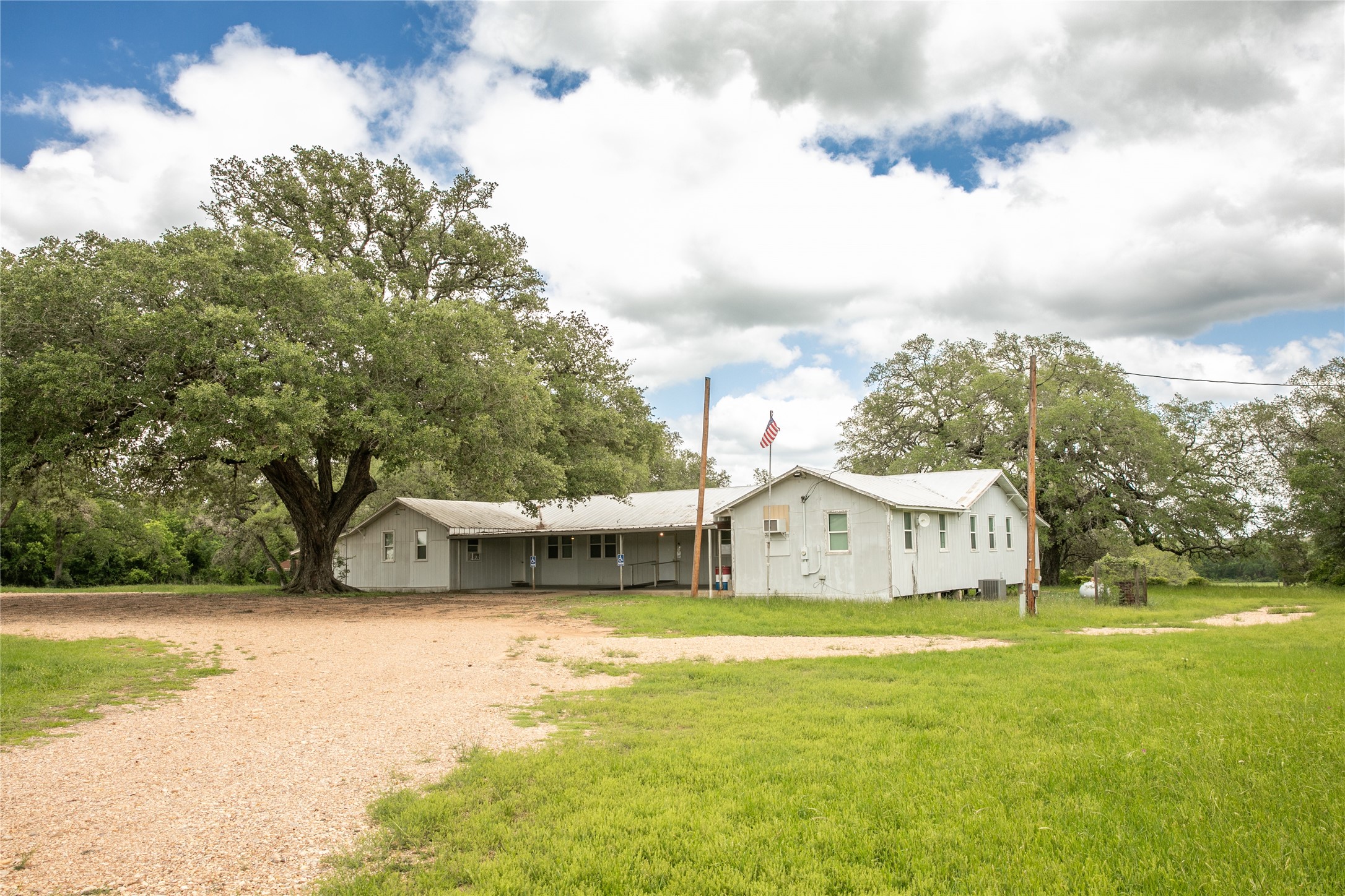 1503 Highway 237 Round Top, TX 78954 - Photo 25 of 25 a view of a house with yard and sitting area