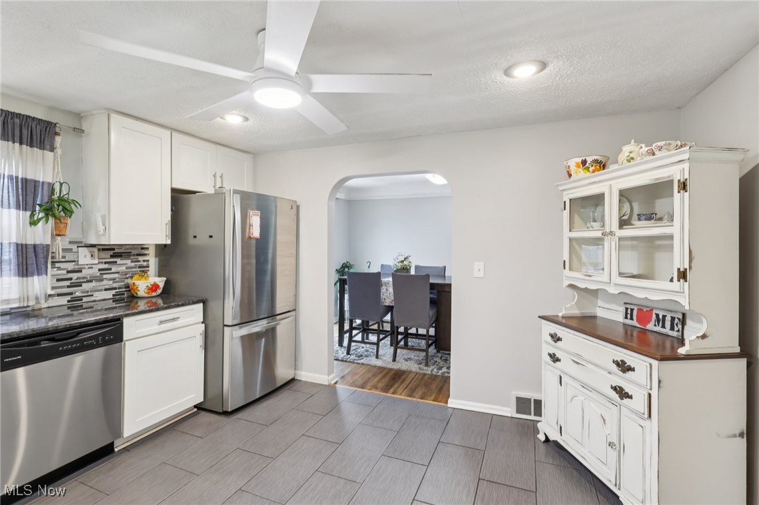 7180 Reynolds Road Mentor, OH 44060 - Photo 5 of 40 kitchen open to dining room for easy serving and entertaining.
