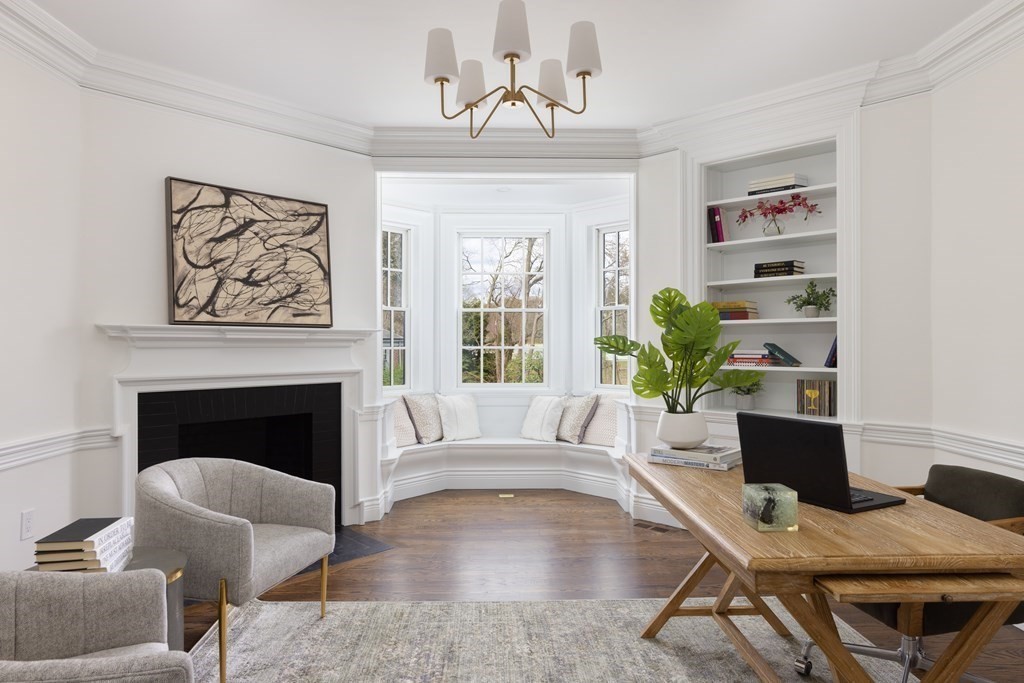 460 Walnut Street Brookline, MA 02445 - Photo 11 of 35 a living room with furniture and a fireplace