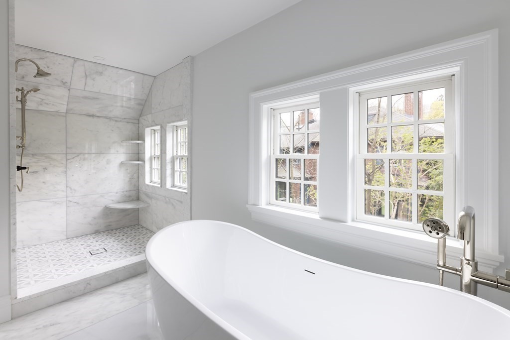 460 Walnut Street Brookline, MA 02445 - Photo 17 of 35 a spacious bathroom with a bathtub and shower