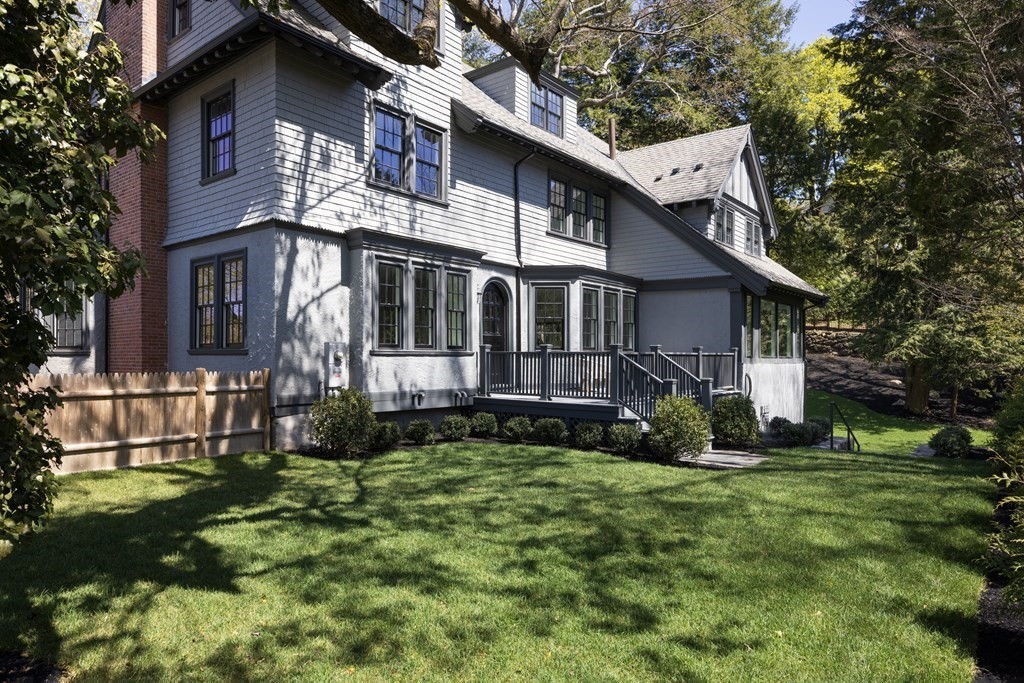 460 Walnut Street Brookline, MA 02445 - Photo 31 of 35 a view of a house with a yard