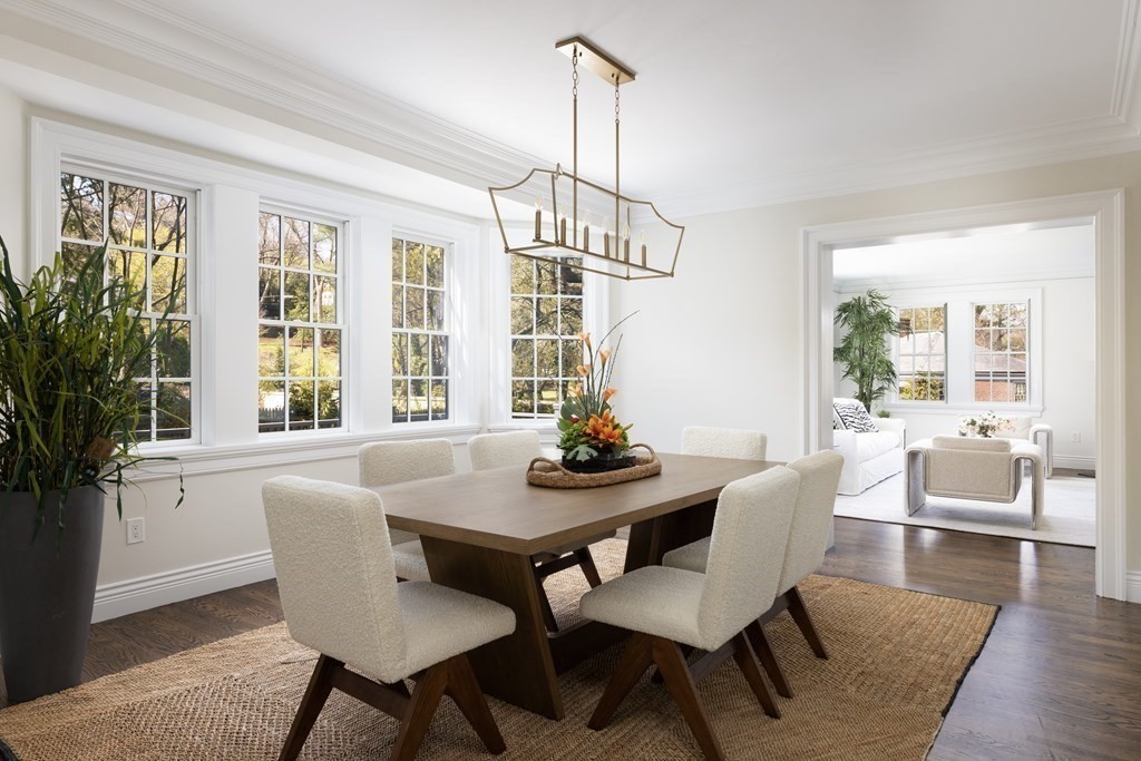 460 Walnut Street Brookline, MA 02445 - Photo 9 of 35 a view of a dining room with furniture window and wooden floor