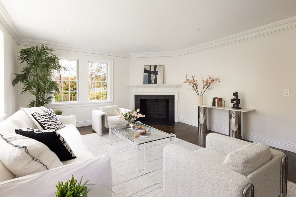 460 Walnut Street Brookline, MA 02445 - Photo 10 of 35 a living room with furniture and a fireplace