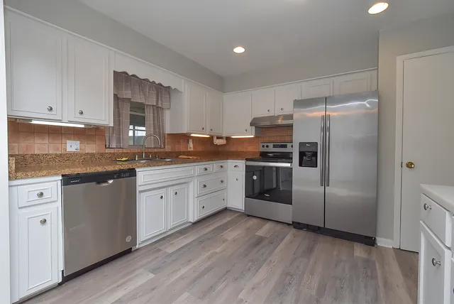 a view of utility room with washer and dryer