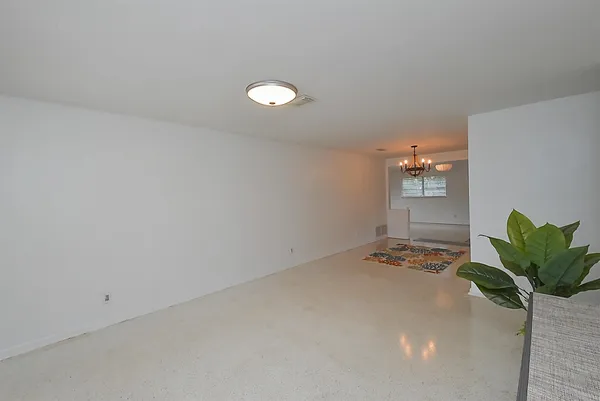 a front view of a house with outdoor seating