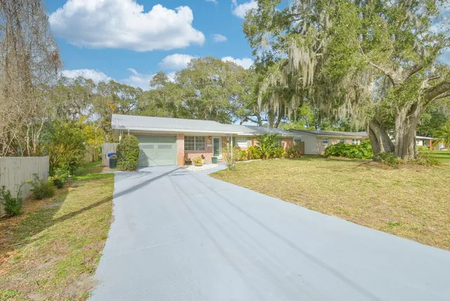 a view of house with outdoor space