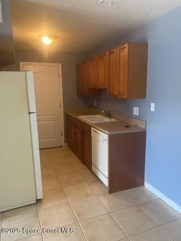 a utility room with washer and dryer