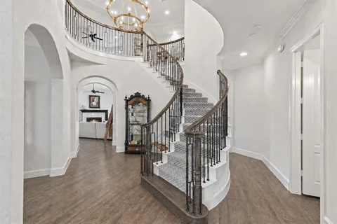 a view of entryway with wooden floor