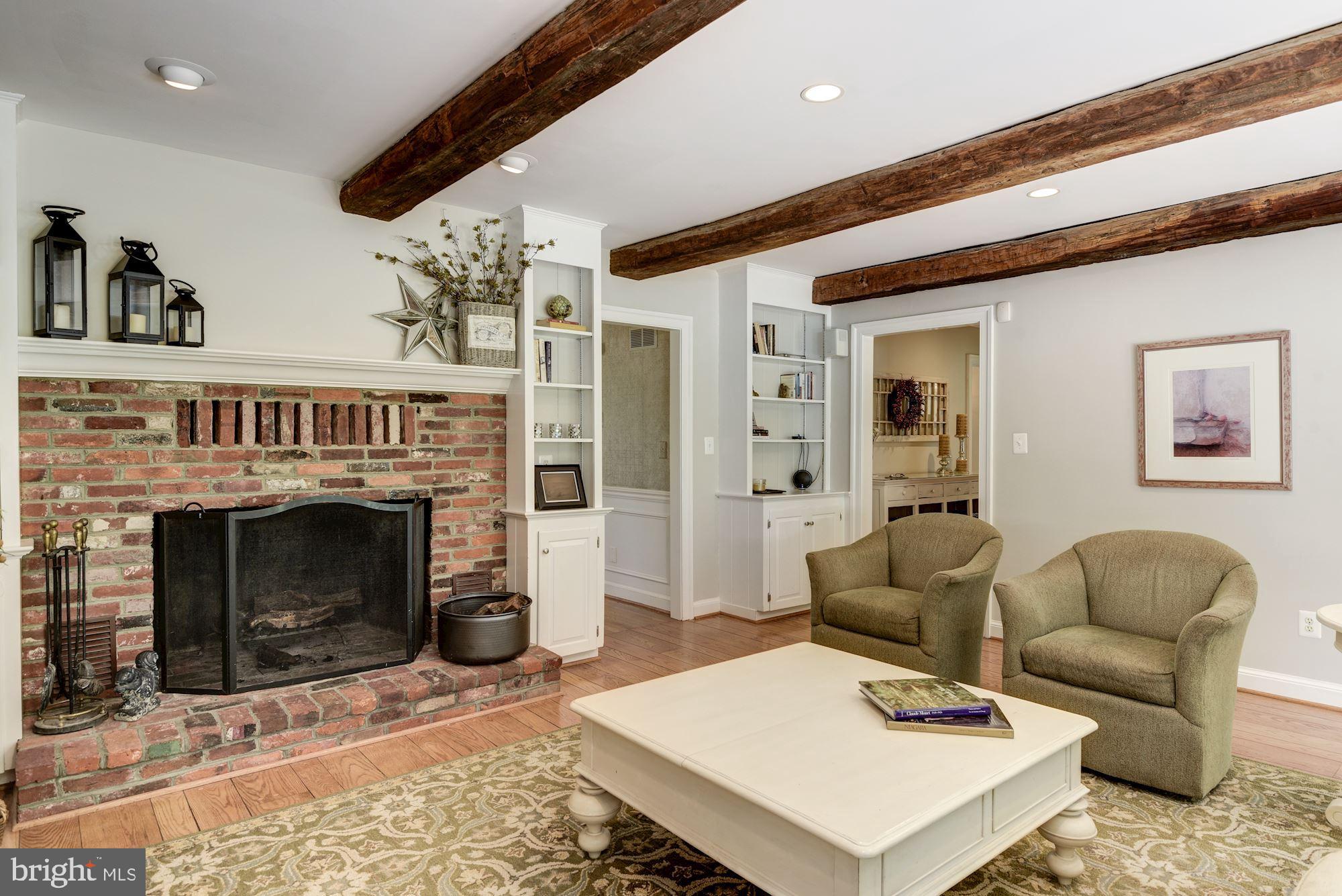 6 Beall Spring Court Potomac, MD 20854 - Photo 13 of 54 Family Room with Brick Wood Burning Fireplace