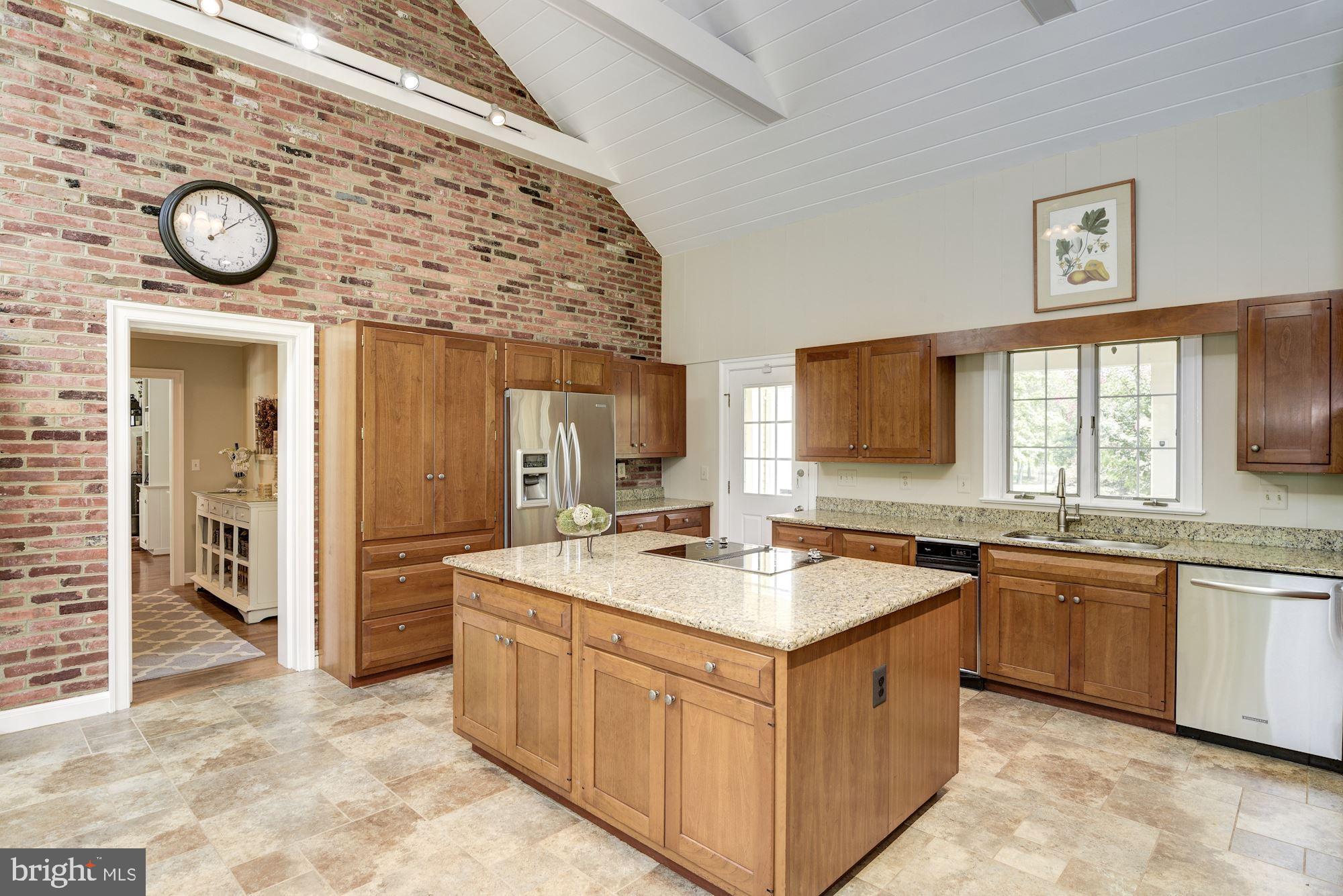 6 Beall Spring Court Potomac, MD 20854 - Photo 17 of 54 Country Kitchen with Brick Walls