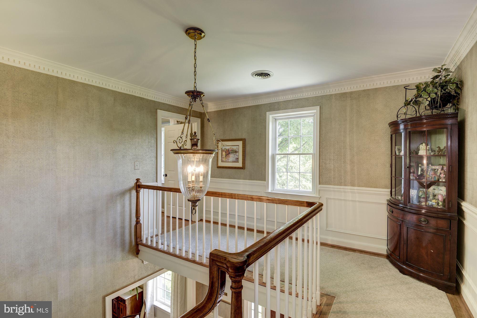 6 Beall Spring Court Potomac, MD 20854 - Photo 24 of 54 Upper Level Hallway with Attic Access