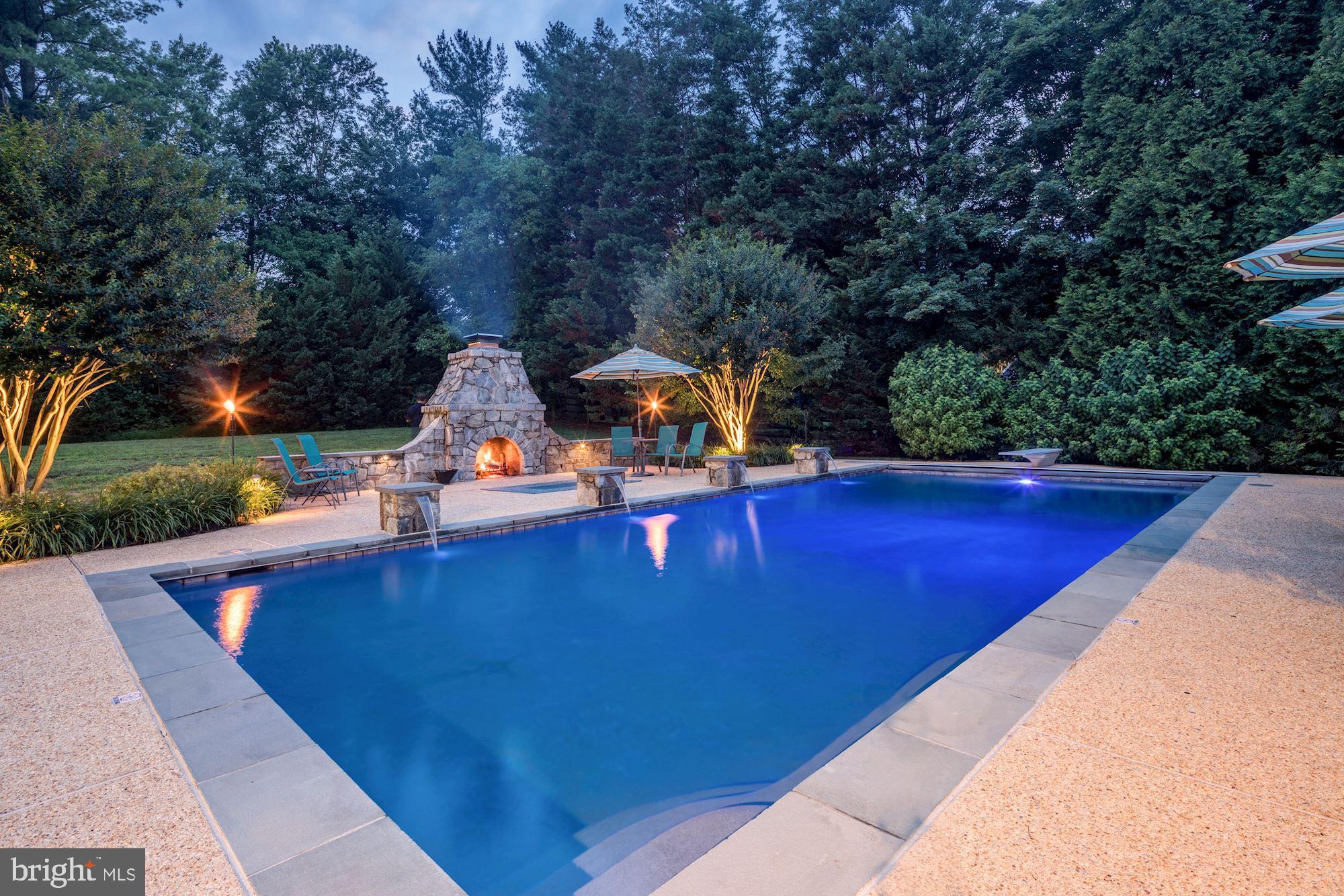 6 Beall Spring Court Potomac, MD 20854 - Photo 40 of 54 Night View of Pool
