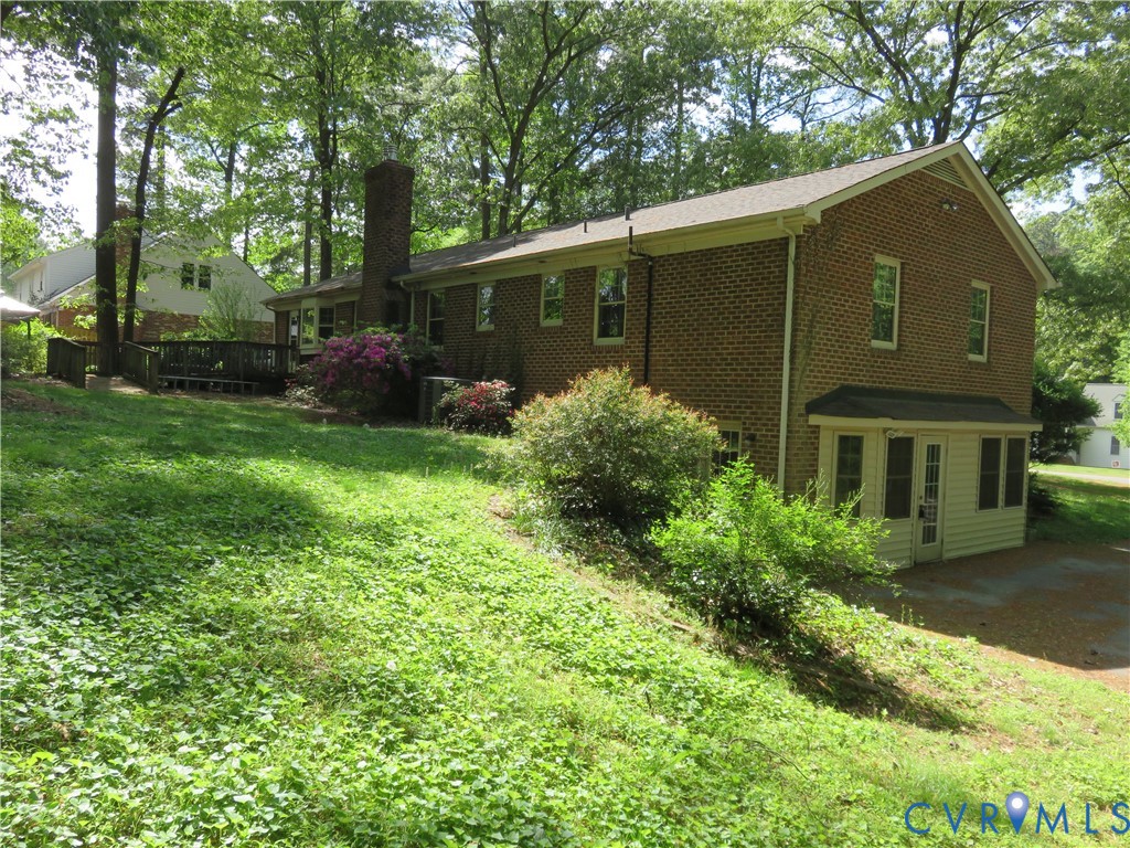 8379 Quailfield Road Mechanicsville, VA 23116 - Photo 7 of 56 a view of a back yard of the house