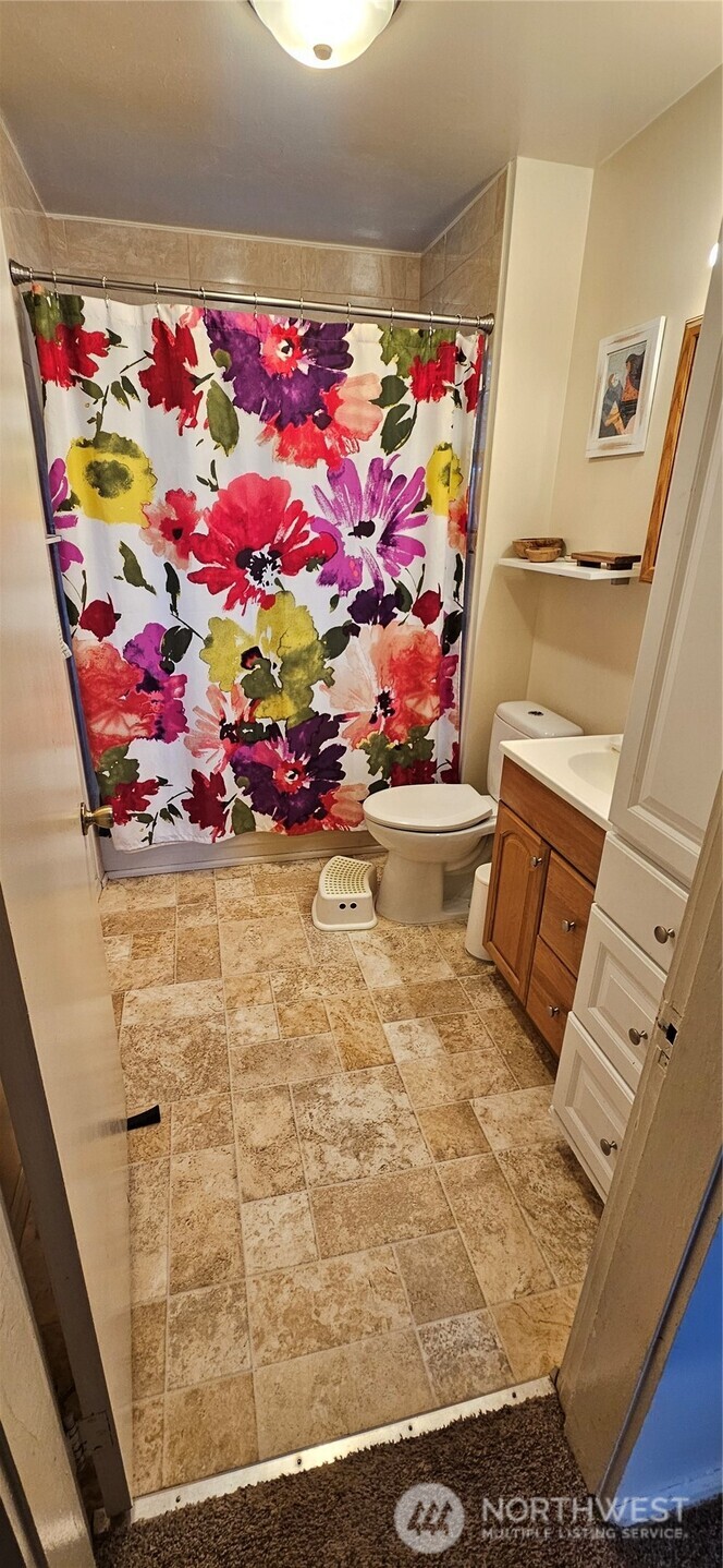 6810 Northeast Bergman Road Bainbridge Island, WA 98110 - Photo 22 of 24 a view of painting on the floor