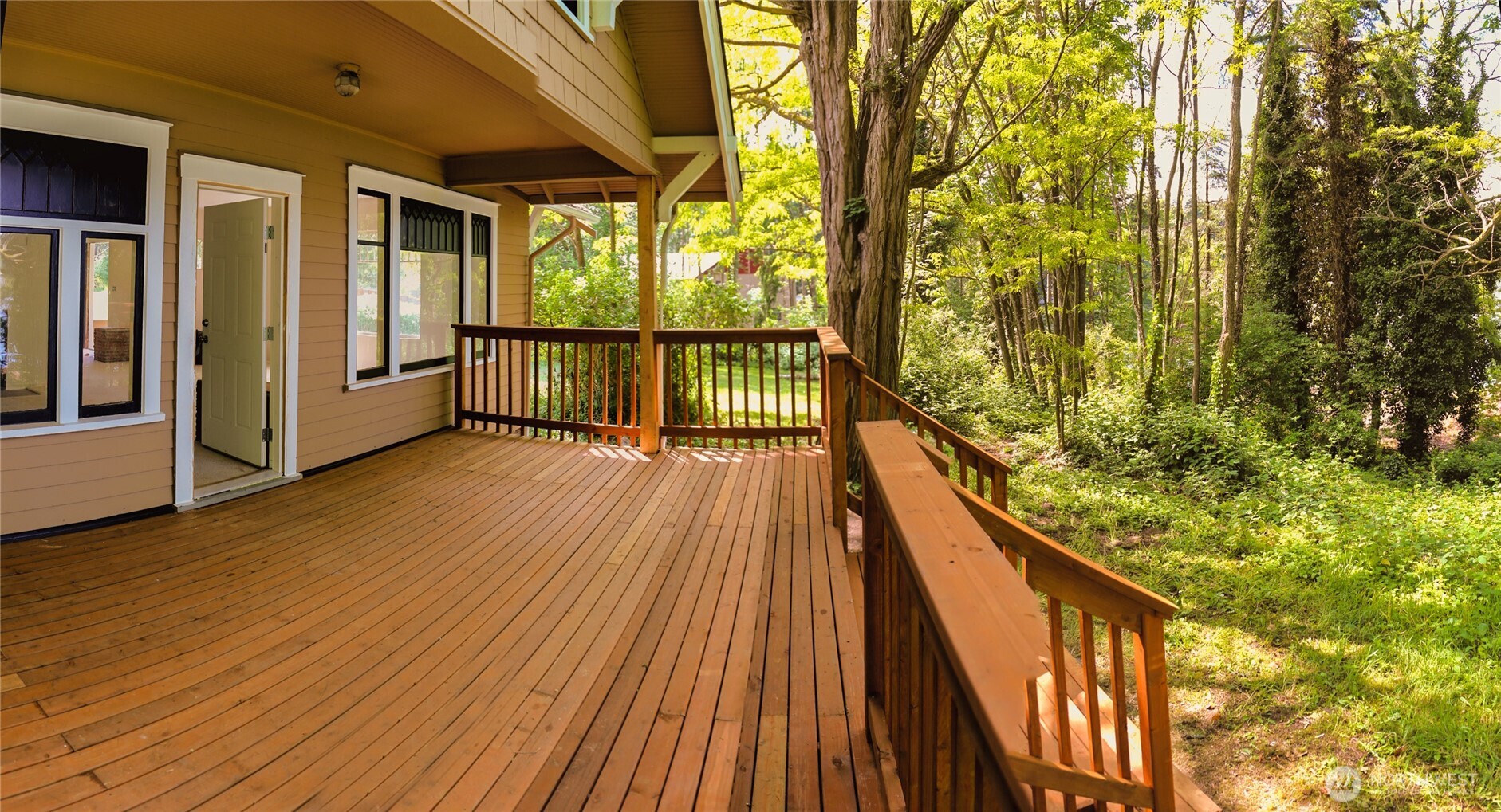6810 Northeast Bergman Road Bainbridge Island, WA 98110 - Photo 9 of 24 a view of balcony with wooden floor