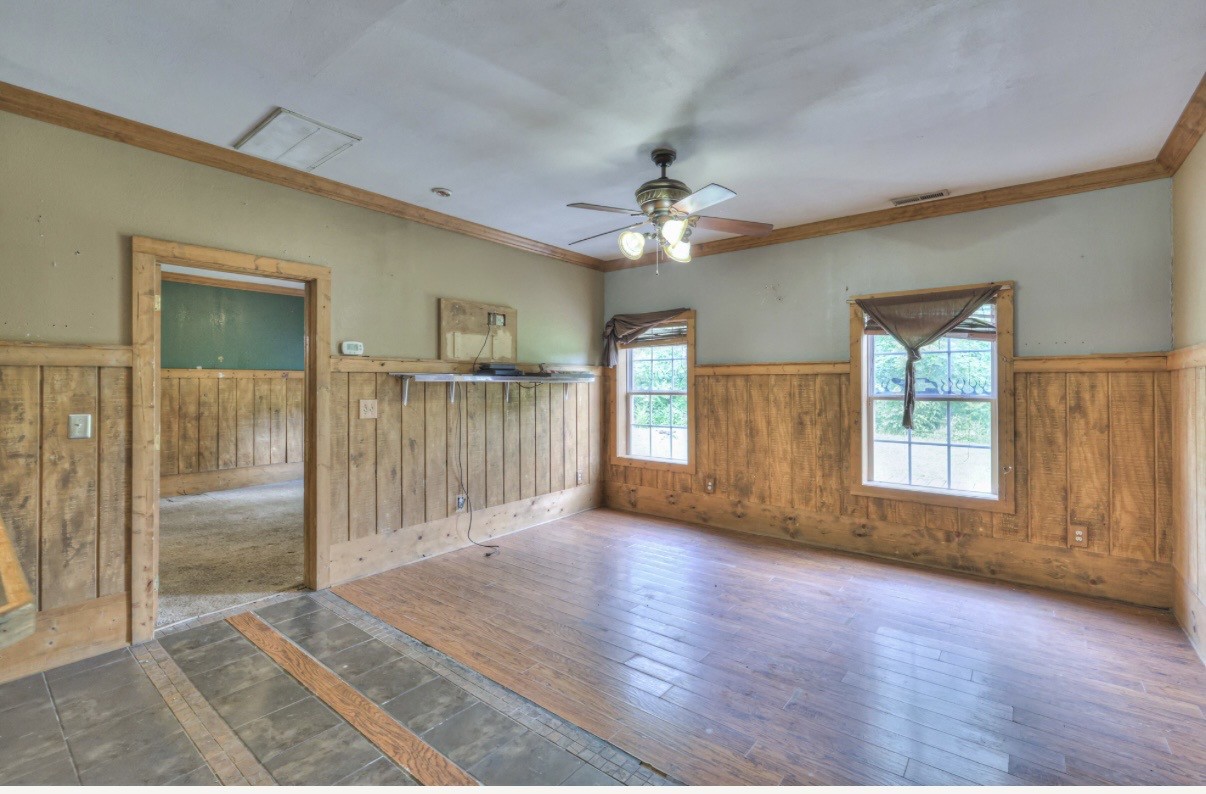 417 Haskins Chapel Road Lewisburg, TN 37091 - Photo 18 of 27 an empty room with wooden floor and a ceiling fan