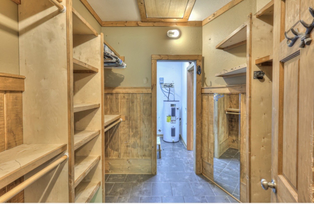417 Haskins Chapel Road Lewisburg, TN 37091 - Photo 23 of 27 a view of walk in closet with wooden floor and door