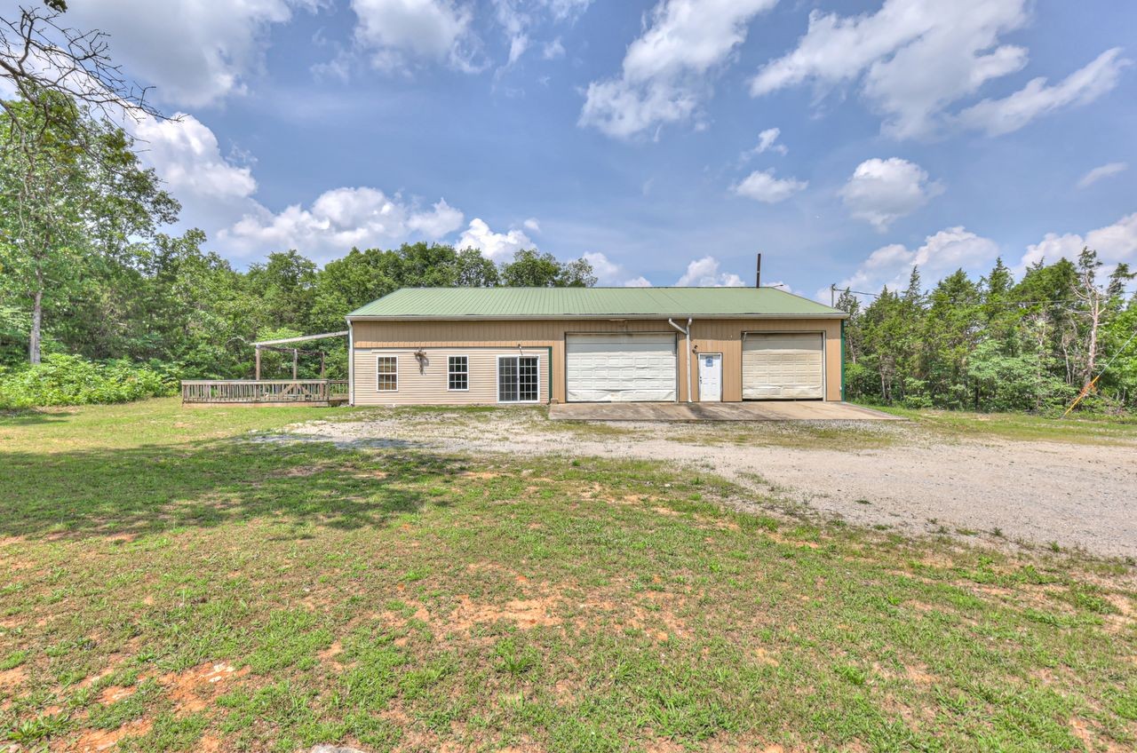 417 Haskins Chapel Road Lewisburg, TN 37091 - Photo 6 of 27 a view of house with backyard and a garden