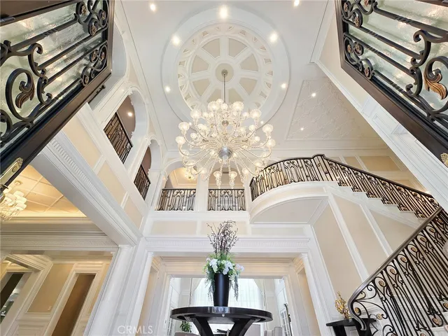a view of an entryway with a chandelier