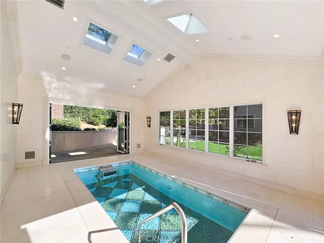 a open hall with yard and outdoor seating