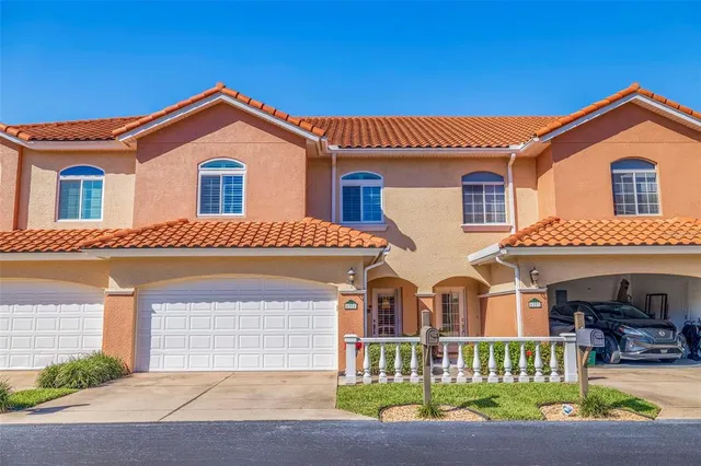 a bathroom with a tub a sink and a shower