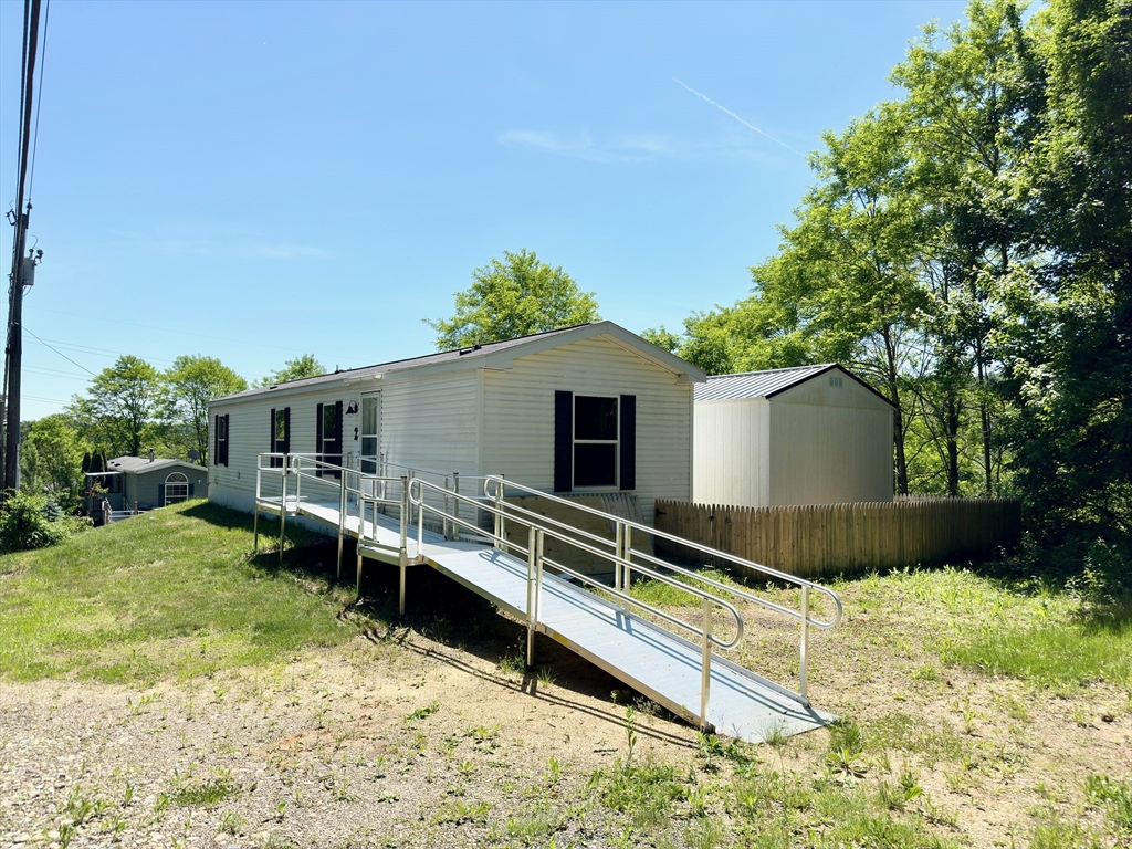 46 Madden Road, Unit 2 West Brookfield, MA 01585 - Photo 14 of 22 a view of house with backyard and furniture