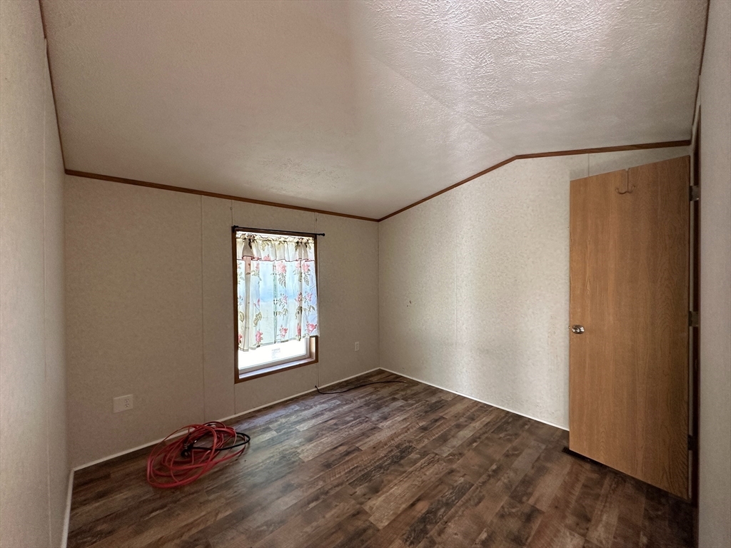 46 Madden Road, Unit 2 West Brookfield, MA 01585 - Photo 8 of 22 a view of an empty room and window