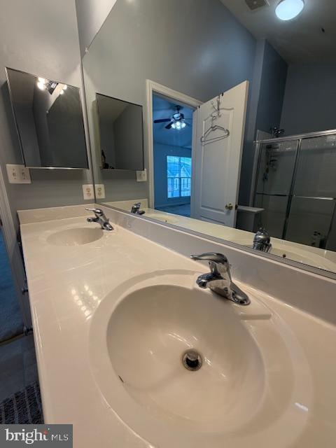 108 Leather Fern Way Frederick, MD 21702 - Photo 11 of 22 a bathroom with a sink and a mirror