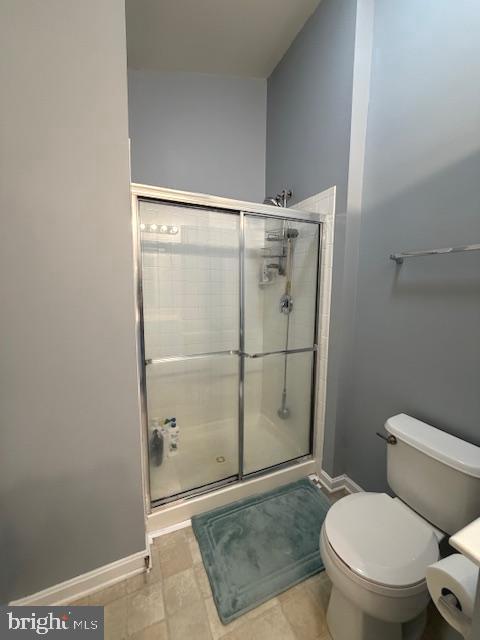 108 Leather Fern Way Frederick, MD 21702 - Photo 13 of 22 a bathroom with a toilet and a shower
