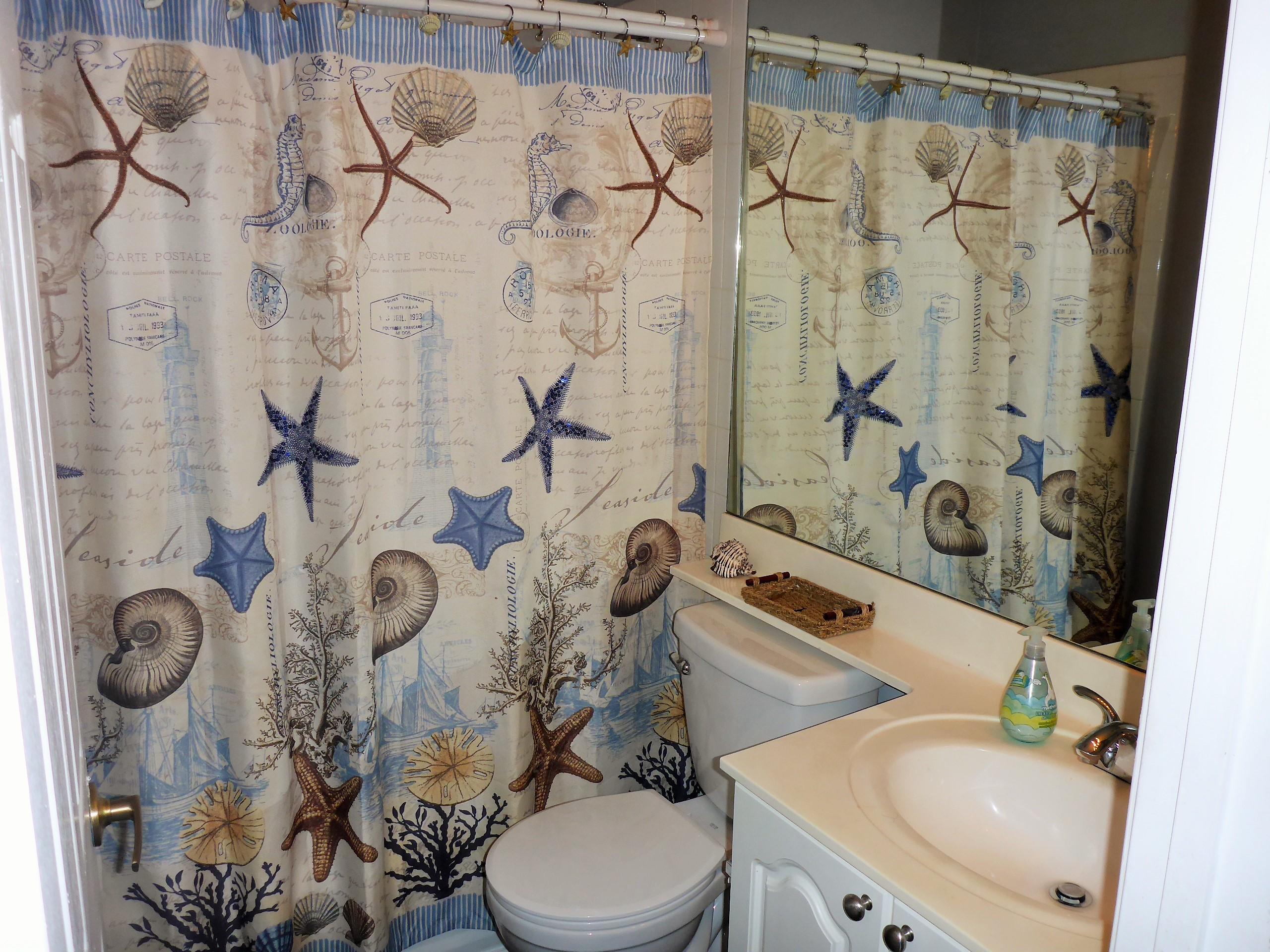 5009 Elpine Way Riviera Beach, FL 33418 - Photo 28 of 41 a bathroom with a sink toilet and shower