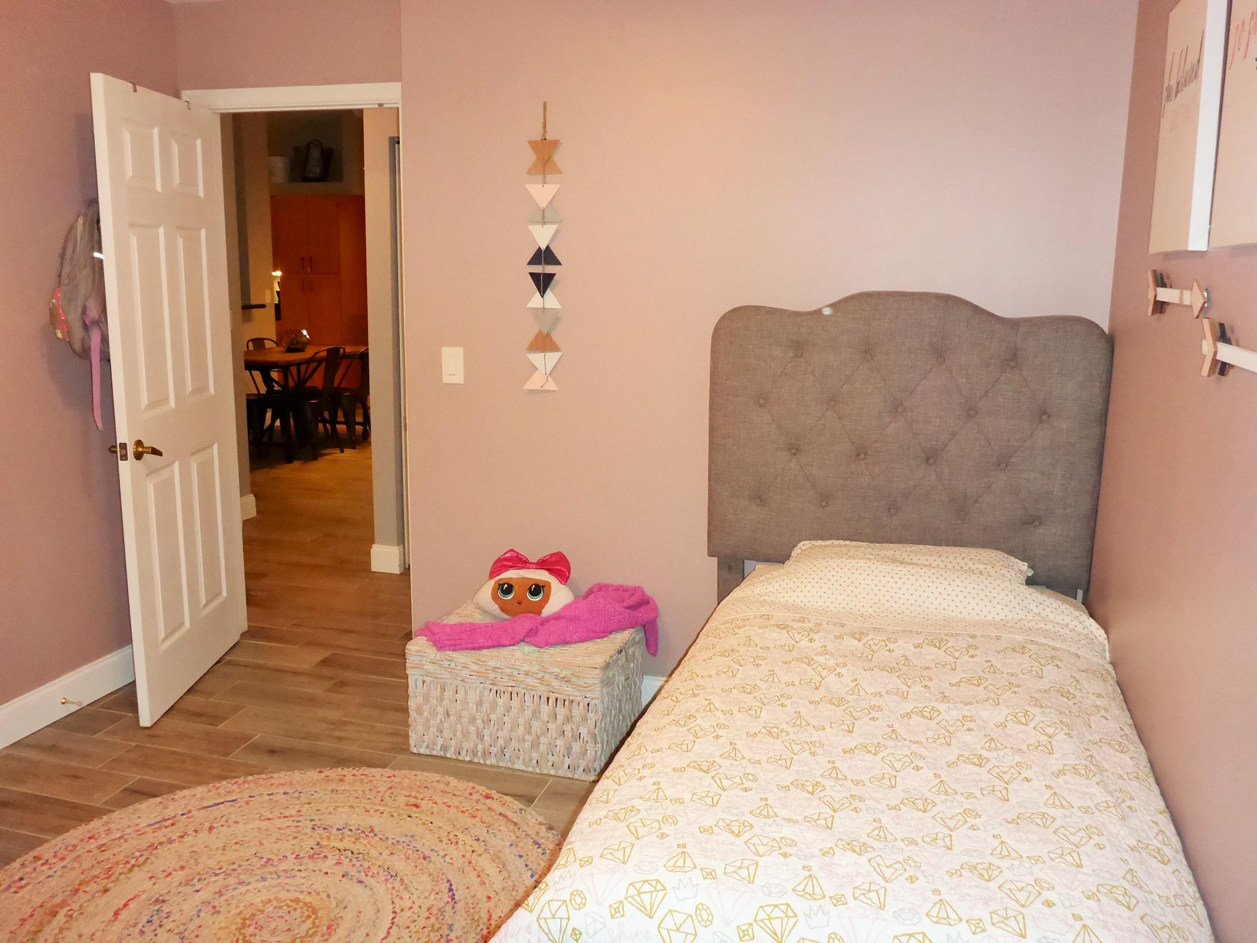 5009 Elpine Way Riviera Beach, FL 33418 - Photo 31 of 41 a bedroom with a bed and a couch