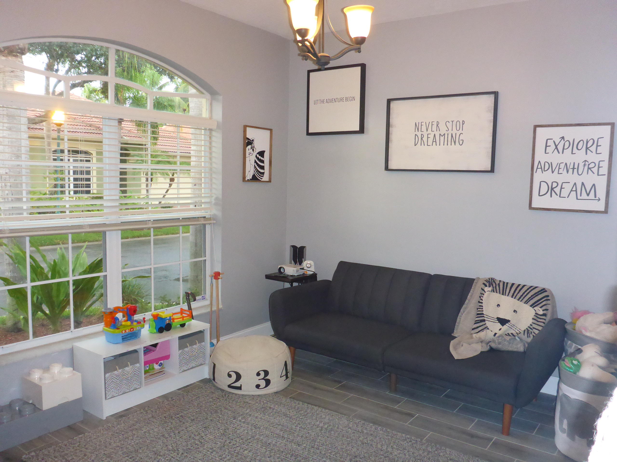 5009 Elpine Way Riviera Beach, FL 33418 - Photo 6 of 41 a living room with furniture and a large window
