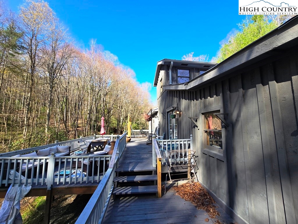 115 Little Horse Path Lansing, NC 28643 - Photo 23 of 33 a view of roof deck with patio
