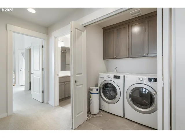 a bathroom with a sink double vanity and a mirror
