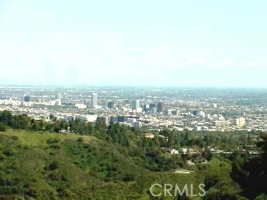 1740 Summitridge Drive Beverly Hills, CA 90210 - Photo 4 of 7 an aerial view of residential houses with city view