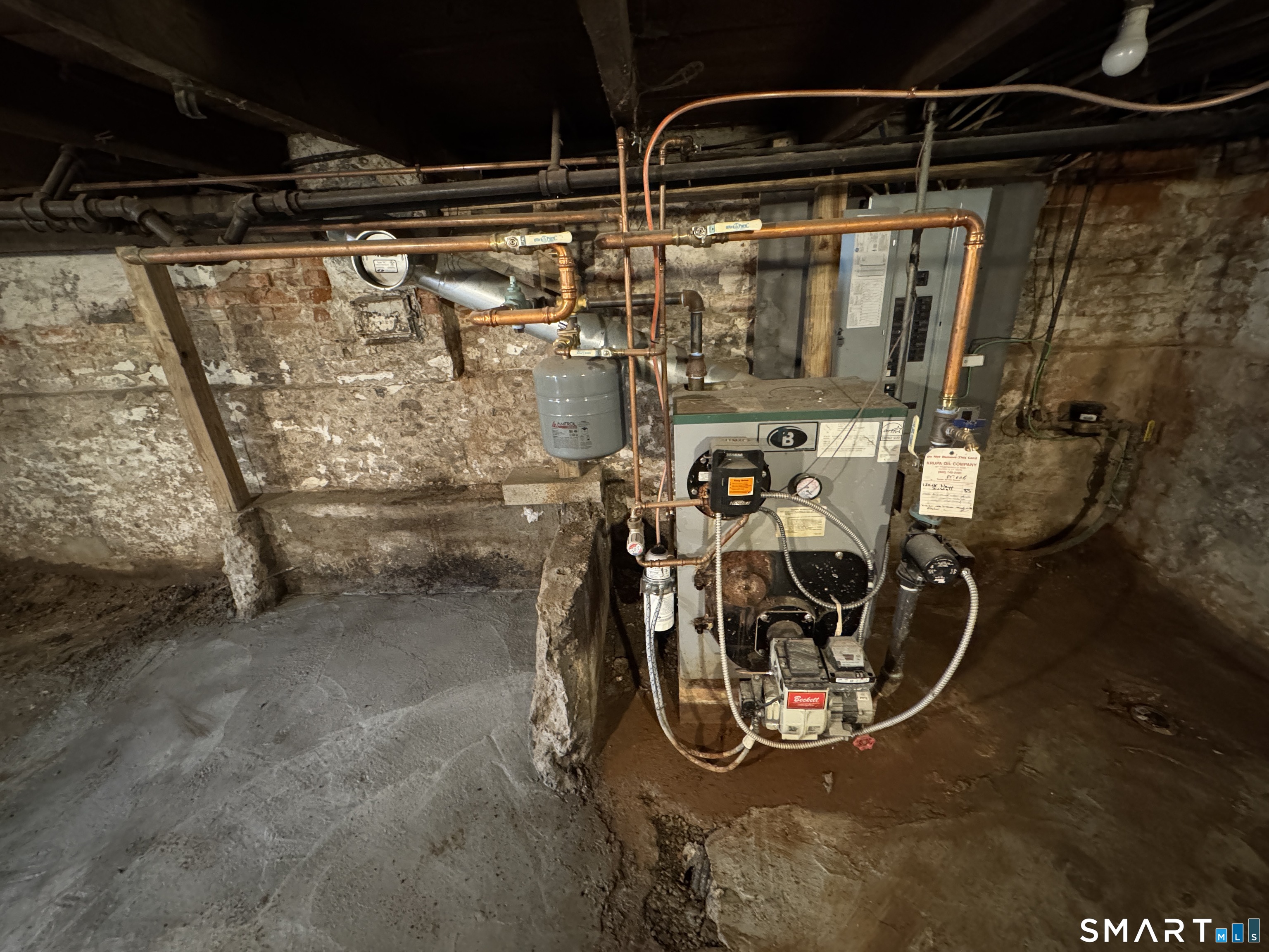 10 Center Street Windsor Locks, CT 06096 - Photo 13 of 25 a view of water heater room