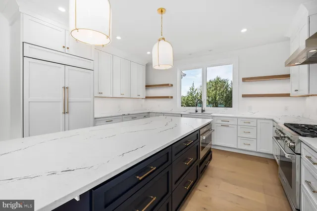 a view of a room with wooden floor and a yard