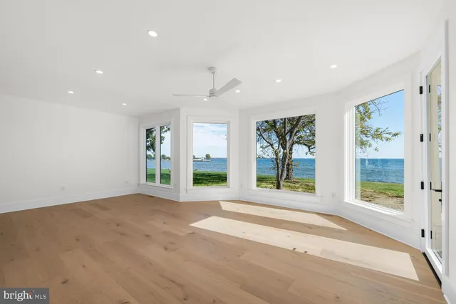 a bathroom with a double vanity sink mirror and a shower