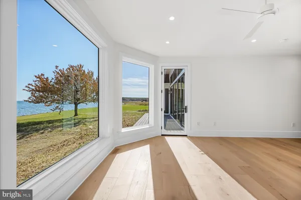 a view of a living room and entry way