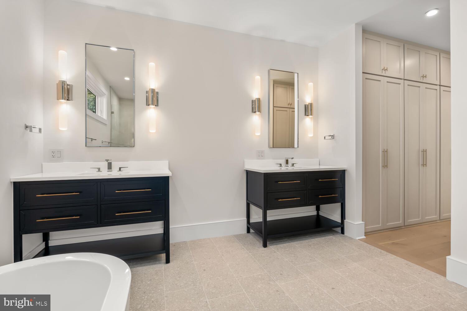 21485 Island Club Road Tilghman, MD 21671 - Photo 27 of 83 a bathroom with a sink and a mirror